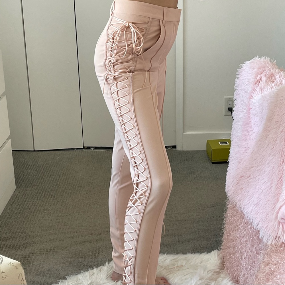 New lace-up pants. Bebe brand. Size 4